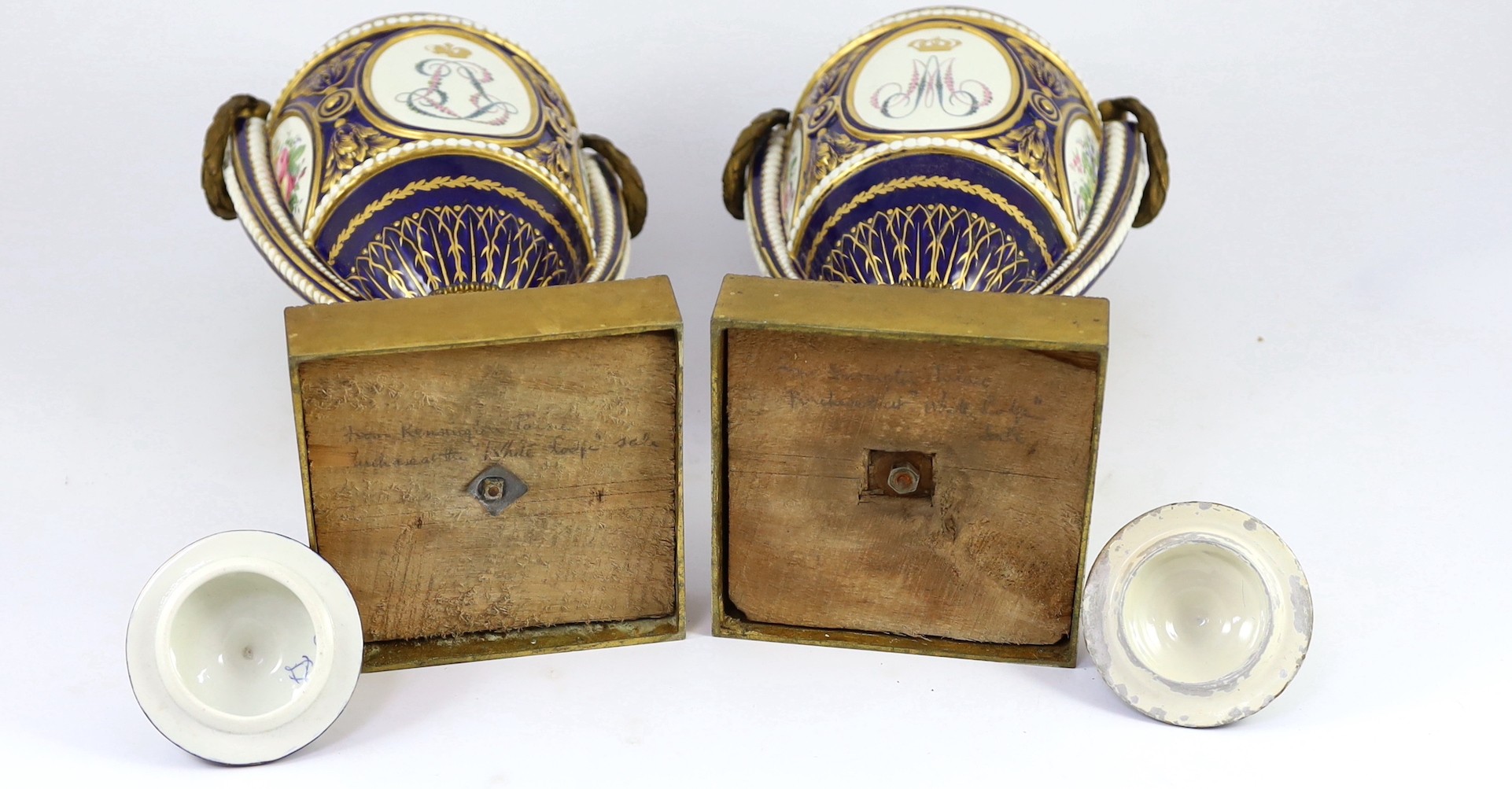 A pair of English porcelain Sevres style ormolu mounted vases and covers, mid 19th century, 44cm high, one replacement cover